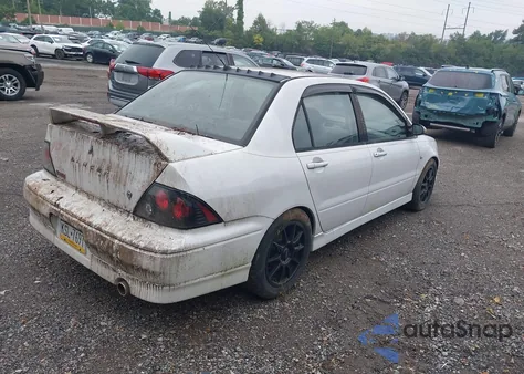 2002 Mitsubishi Lancer Oz Rally from USA, damaged, VIN JA3AJ86E42U061462